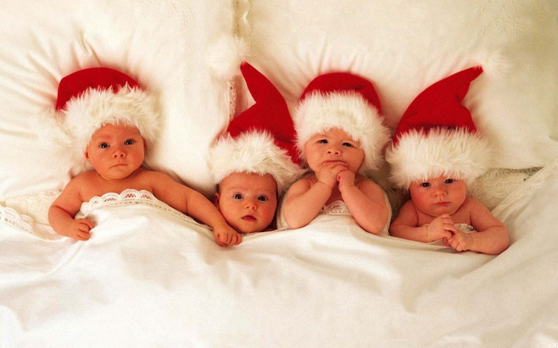 Download Wallpaper Four sweet little babies with Christmas hat