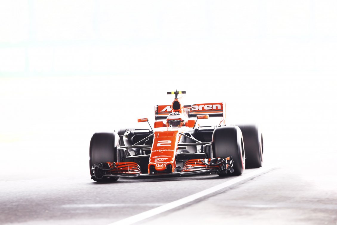 Download Wallpaper Super speed on Formula 1 Race car - Red car on the road
