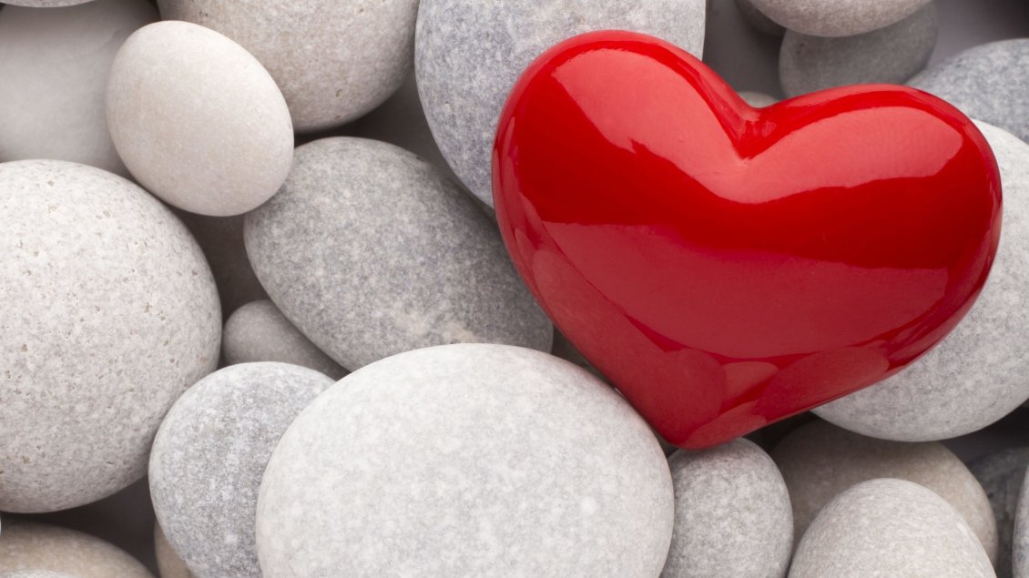 Download Wallpaper Big red heart near grey rocks - Love wins Valentines Day
