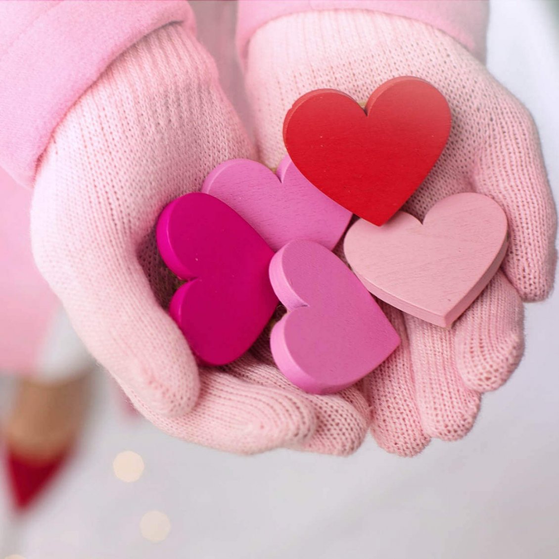 Download Wallpaper Painted wooden hearts on my hand - Love  red pink colors