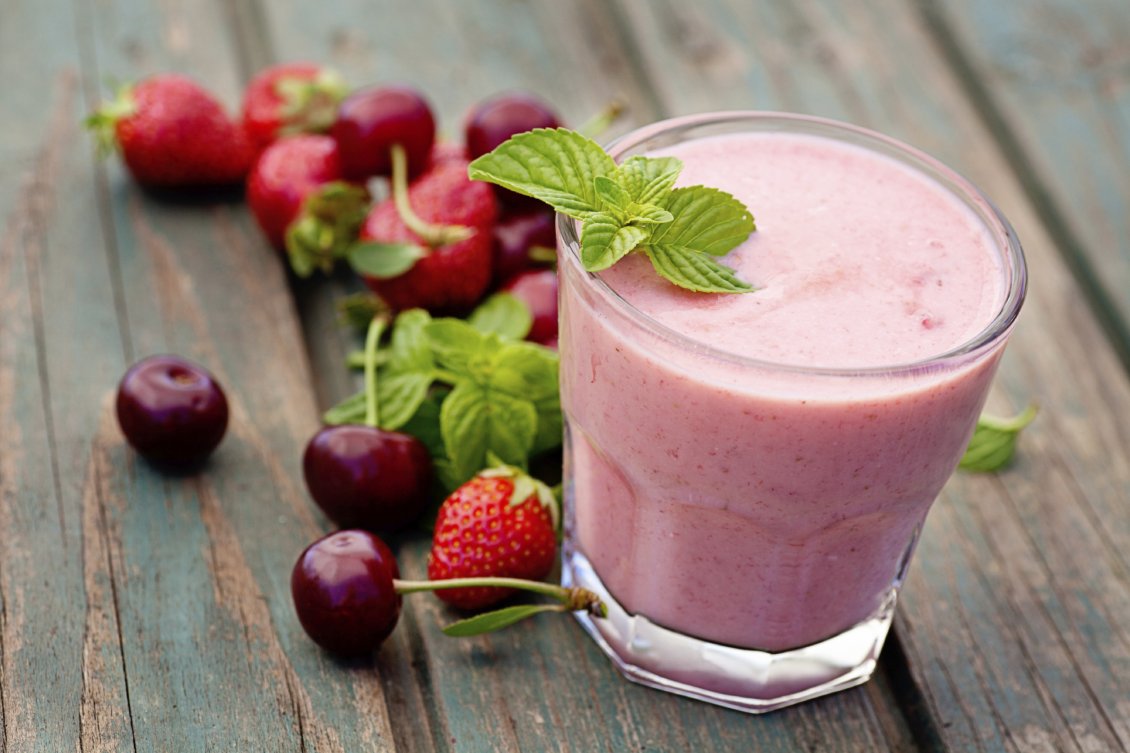 Download Wallpaper Delicious glass of smoothie with strawberry cherry and mint