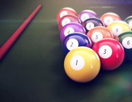 Pool balls and cue