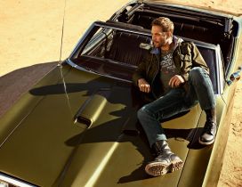 Paul Walker on the green car in the desert