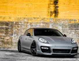 Grey Porsche Panamera with black rims