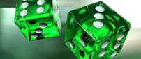 Two green dice in air - 3D wallpaper