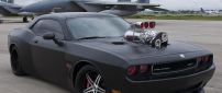 Black Dodge Challenger on the airport