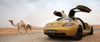 Gold AMG Mercedes Benz SLS in the desert