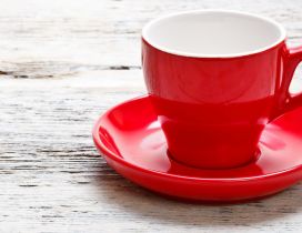 Red coffee cup on the table