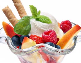 Vanilla ice cream with fruits and mint