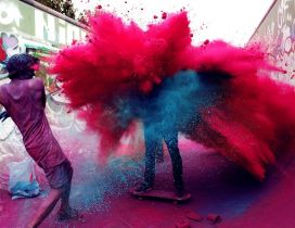 Two guys who throw colored powder