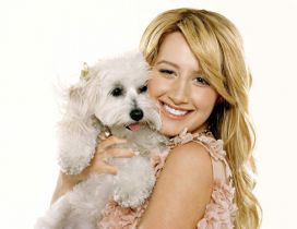 Ashley Tisdale with her gray puppy