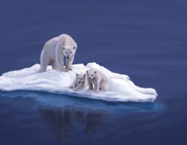 A polar bear and two cubs on the ice island