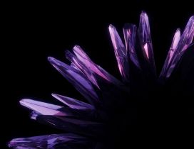 Purple crystal in the black background