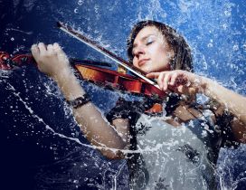 A girl playing the violin in the rain
