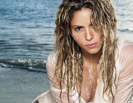 Shakira on the shore of the sea