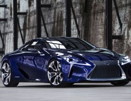 Blue Lexus LF-LC Coupe in a wilderness place