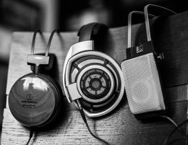 Three different headphones - White and black image