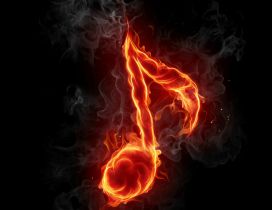 A musical note in flames on the black background