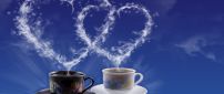 Two coffee cups for two hearts