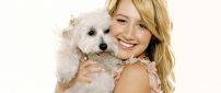 Ashley Tisdale with her gray puppy