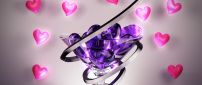 Abstract glass with many purple hearts