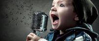 A child sings at the microphone - Abstract music