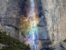 Waterfall on the rocks in many colors