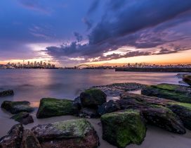 Sydney Skyline, Australia - Colorful stones on the beach