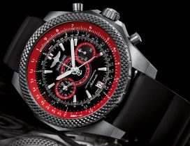 Red and black breitling watch - Brand wallpaper