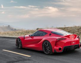 Awesome red Toyota Supra - Sport car on the road