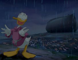 Donald Duck standing in the rain at night