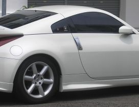 White Nissan 350Z in the parking