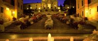 The fountain in front of the Spanish Steps in Rome