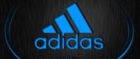 Blue adidas logo on the black background