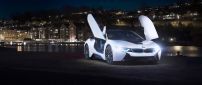 White BMW I8 Concept with opened doors in the city