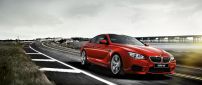 Red BMW M6 F13 Coupe on road - Gorgeous car