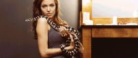 Angelina Jolie with a white with black snake