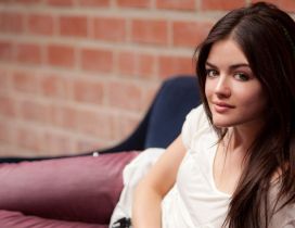 Beautiful Lucy Hale relax on the blue sofa