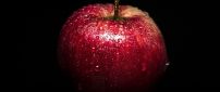 Fresh red delicious apple with water drops