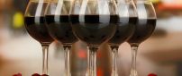 Six glasses with red wine - Drink wallpaper