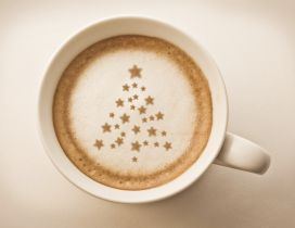 Christmas tree on a cup of coffee