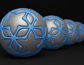 3D gray balls with blue lines on black background