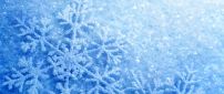 Perfect snowflake - frozen blue snow