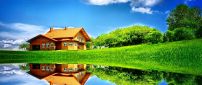 Wonderful house mirror in the lake - Sunny summer day