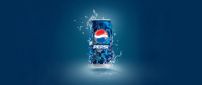 Enjoy Pepsi refreshes the world - blue juice drink