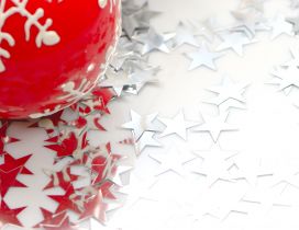 Silver stars and one red Christmas ball