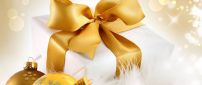 Golden Christmas accessories - ribbon and balls