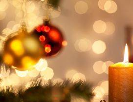 Golden candle under the Christmas tree - Magic light