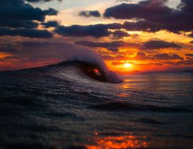 Big waves in the cold ocean water - Wonderful sunset