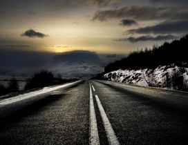 Black night and dark road in winter season